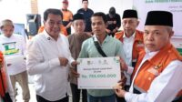Pemkab Tangerang Bersama BAZNAS Salurkan Santunan Yatim-Dhuafa dan 80 Gerobak Usaha